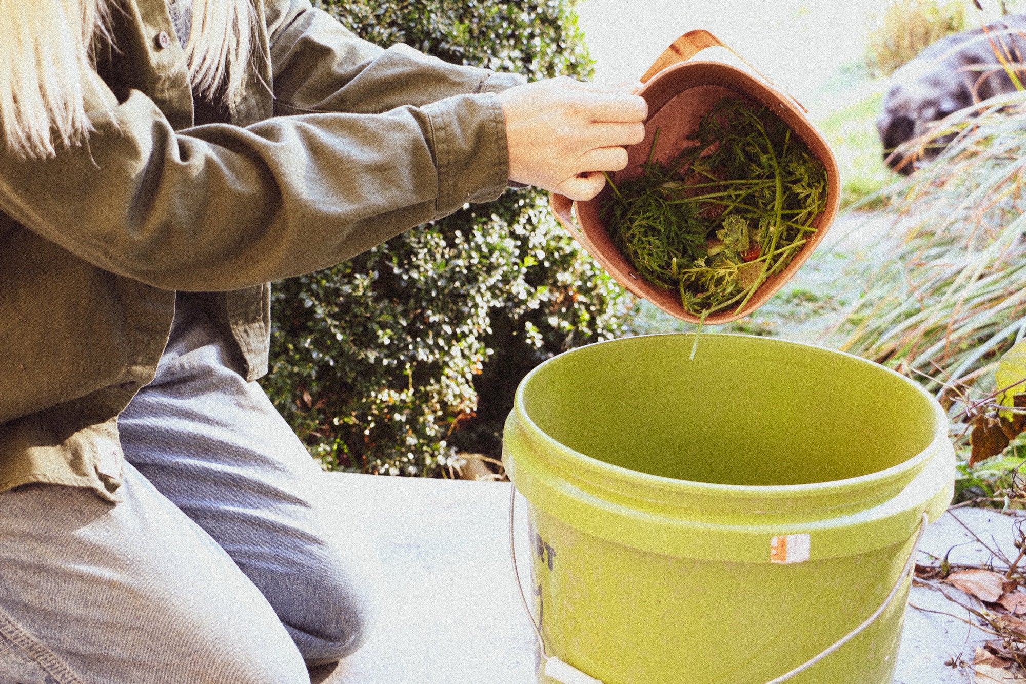 Kenkashi in Bamboozle compost bucket pours into 5-gallon bucket
